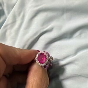 Pink and Silver Ring with Oval Gemstone and Halo Accents